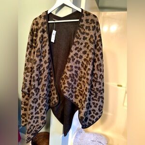 Reversible animal print shawl.